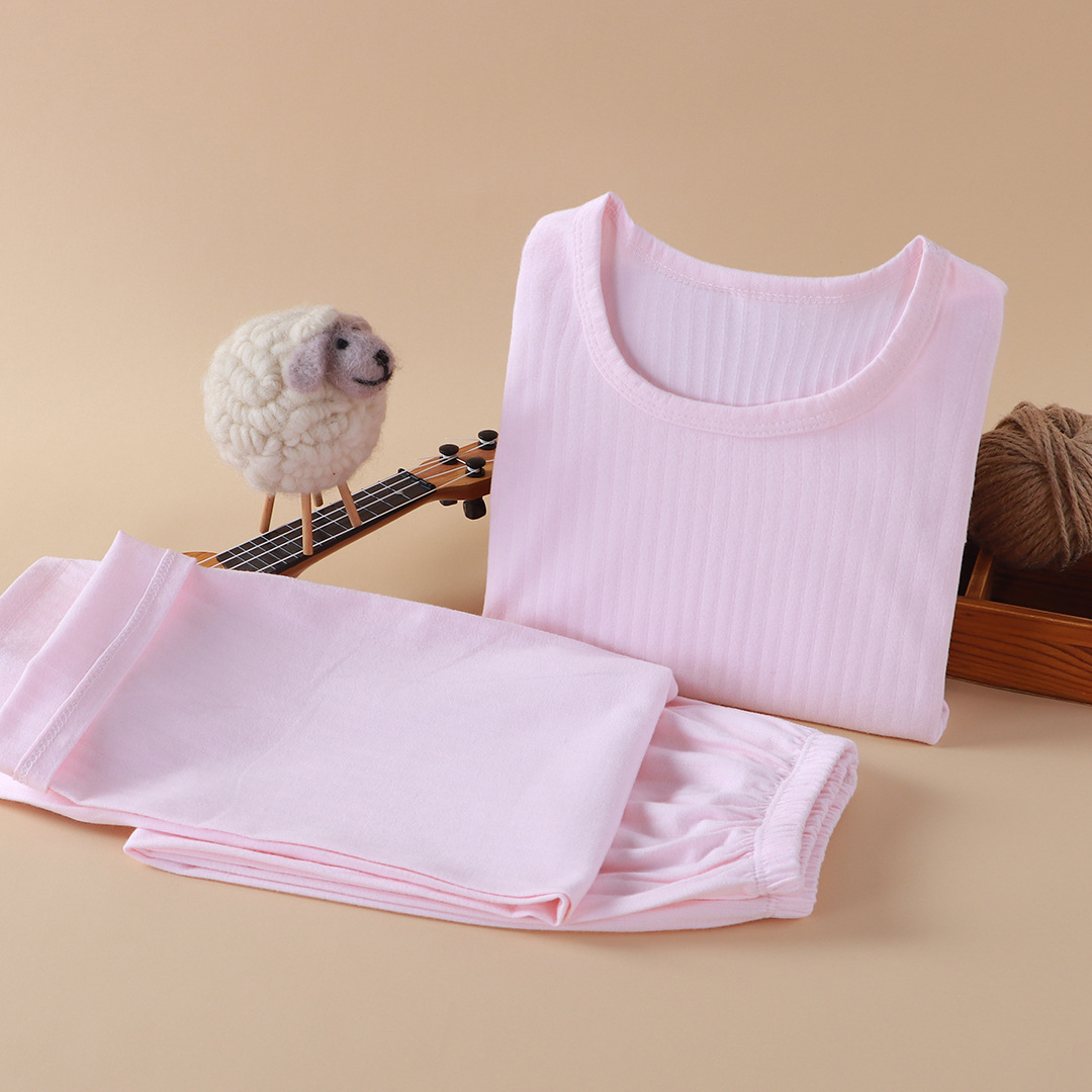 Nueva ropa infantil para el hogar sin huesos pijamas de manga larga primavera y otoño ropa de aire acondicionado de niñas algodón hombre