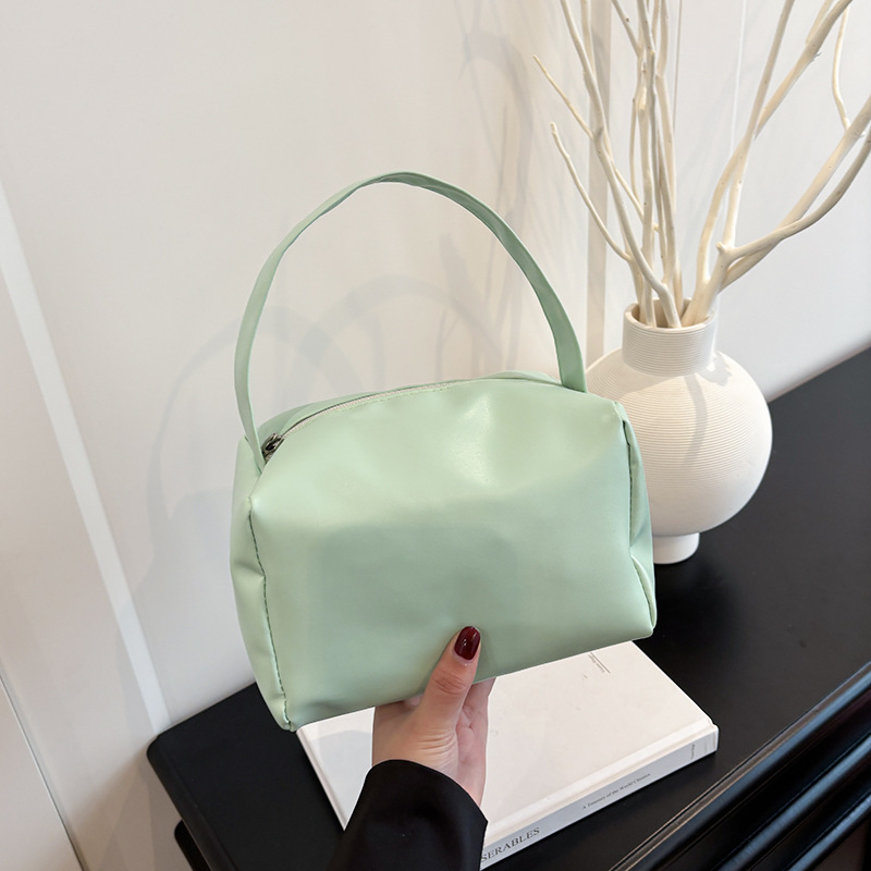Bolsas de brazo populares de este año, bolsas de moda de moda coreana, bolsas pequeñas de primavera y verano 2025, bolsas de mujer casuales de nicho de moda.
