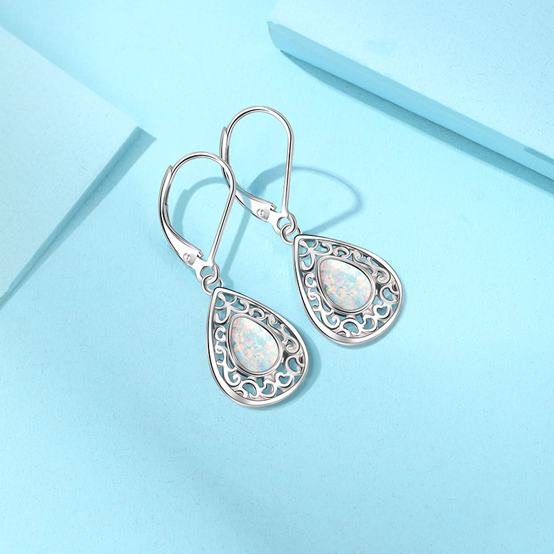 925 plata esterlina forma de gota de agua sintética OPPO pendientes para mujeres Europa y América lujo ligero nicho de alto nivel sensación OPPO pendientes de piedra