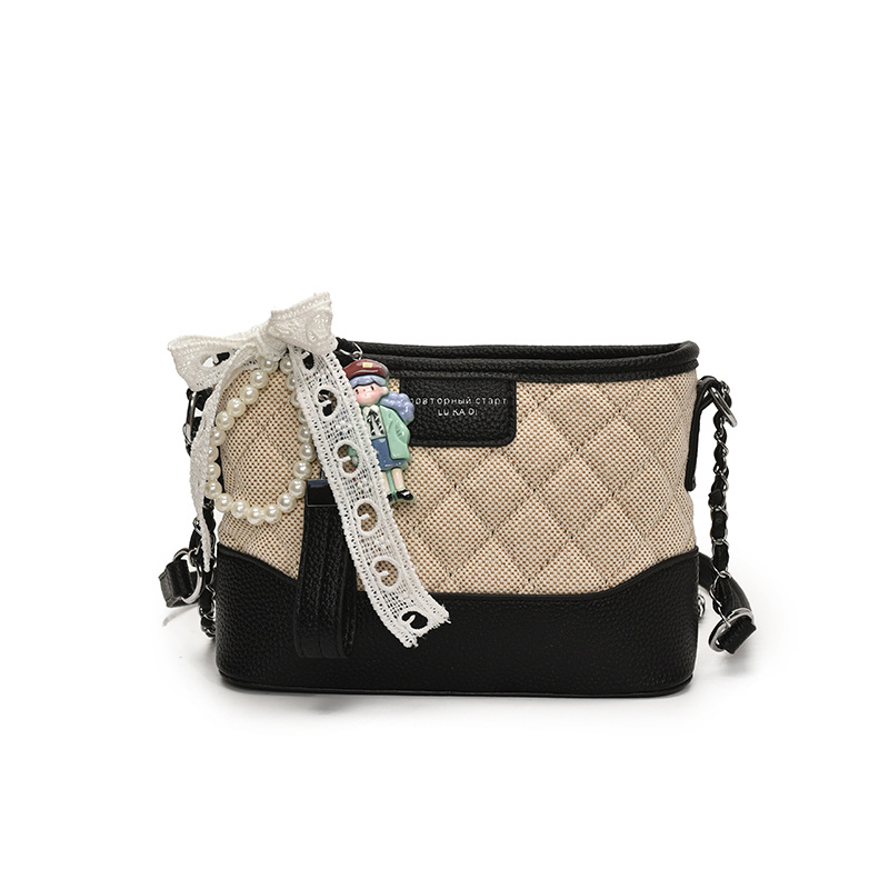 Bolsos pequeños de color de contraste populares de este año para mujer 2025 nuevo bolso de hombro de cadena de diamante bolso callejero de mensajero de todo fósforo de moda