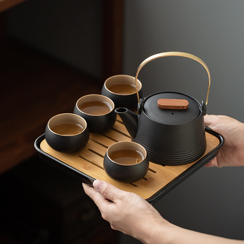 Japanese black pottery tea set with beam, one pot, four cups, tea tray, office home tea set gift box with custom logo