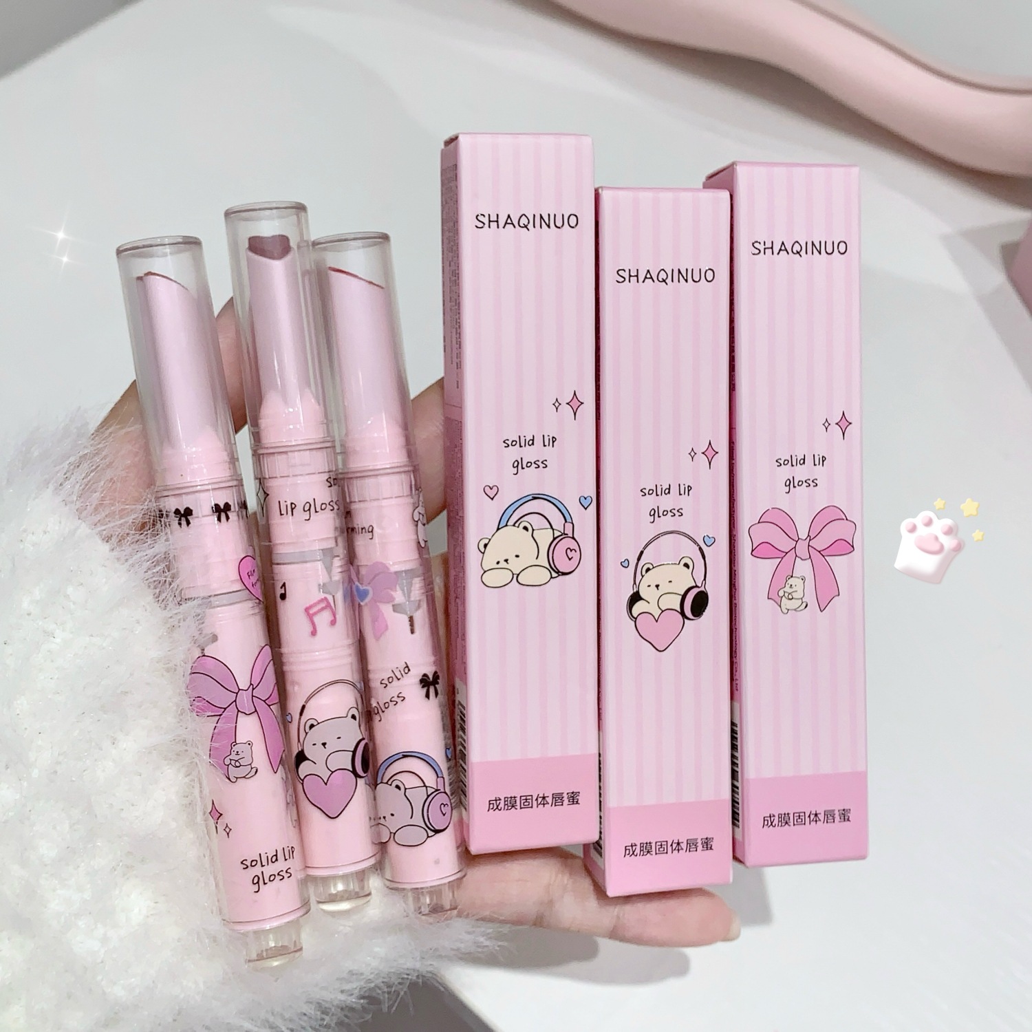 SHAQINUO película sólida miel labial espejo esmalte labial agua brillante humedad labial gelatina blanqueador labial de mujer