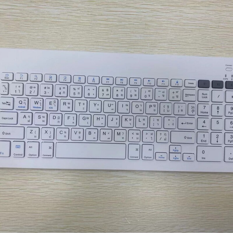 Thai wireless bluetooth keyboard. Rechargeable silent ultra-thin mini computer mobile phone tablet laptop keyboard Thai wireless bluetooth keyboard. Rechargeable silent ultra-thin mini computer mobile phone tablet laptop keyboard