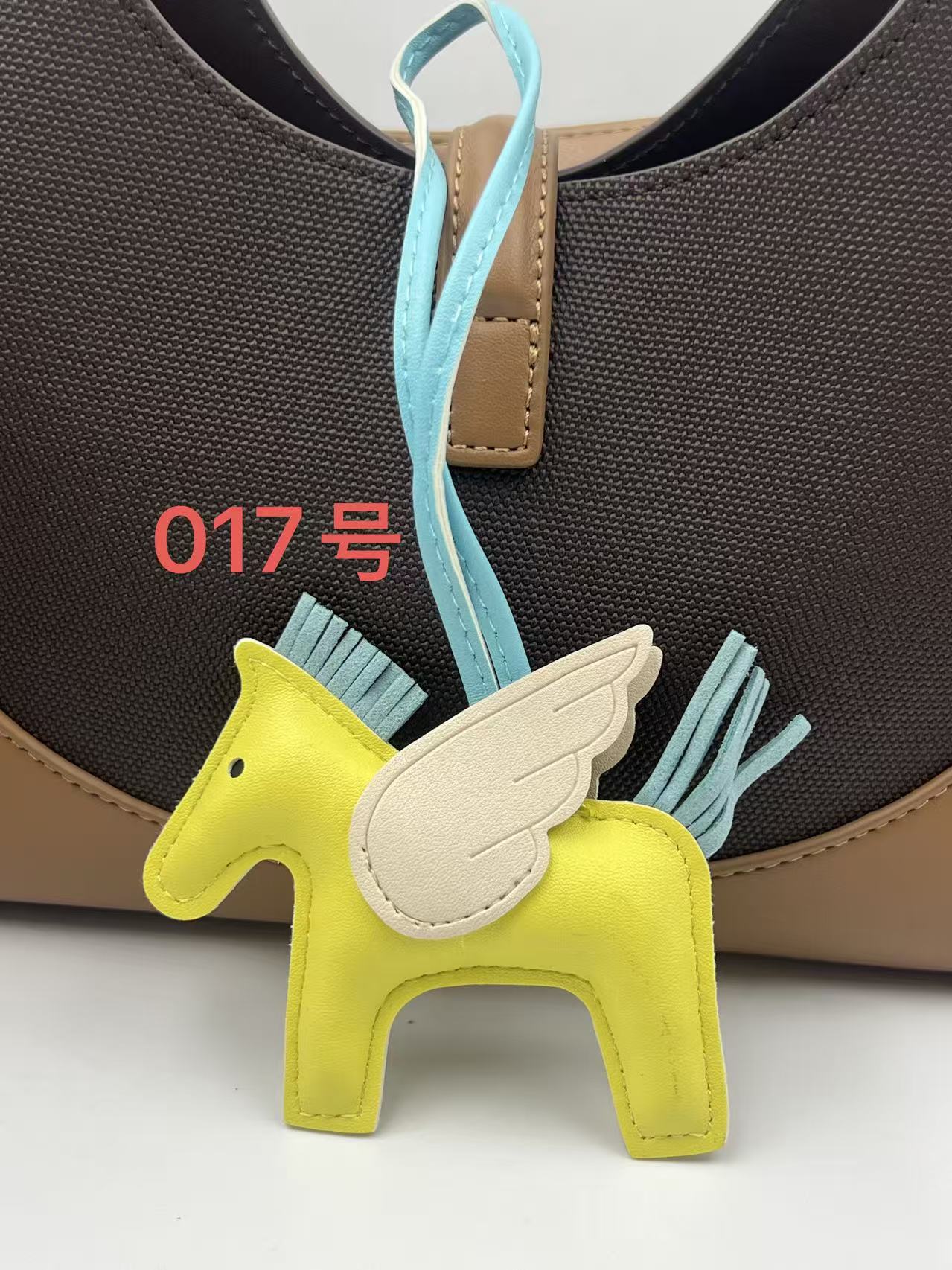 Colgante de bolsos Pegasus Mini Colgante de bolsos de estilo simple llaver de cuero image 22