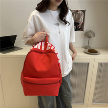 日系纯色简约运动字母双肩包通勤初中大学生书包大容量轻便上课包