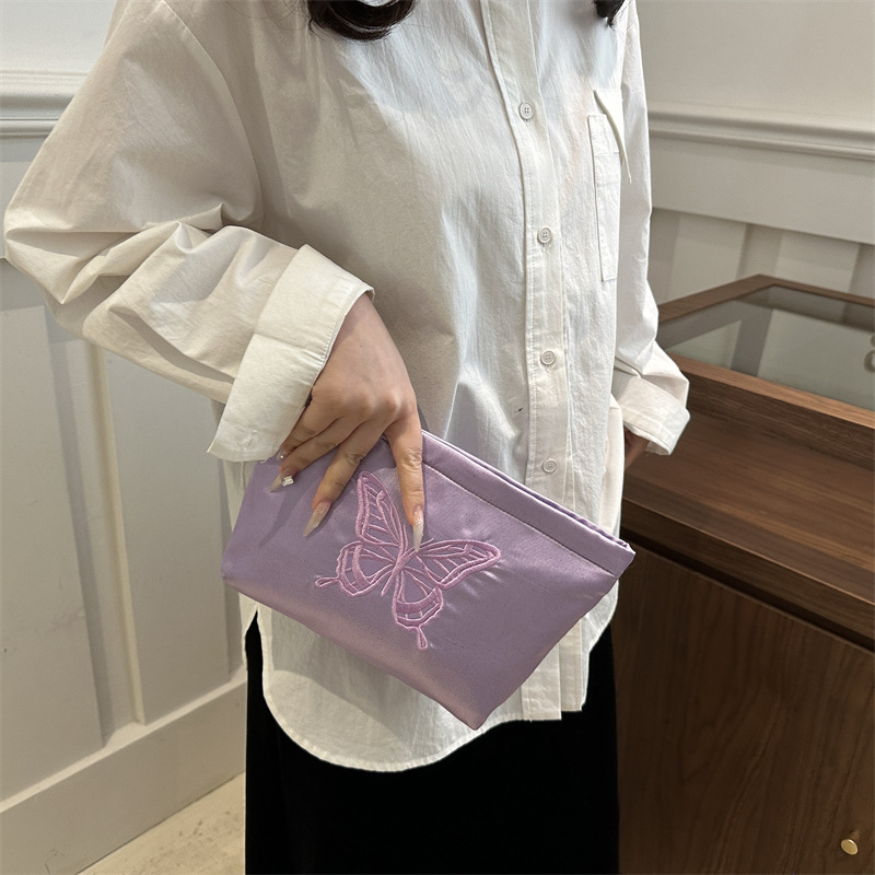 Bolsa de cosméticos con lazo bordado retro, lápiz labial, productos para el cuidado de la piel, bolsa de almacenamiento de artículos diversos, bolso de embrague portátil de gran capacidad, marea