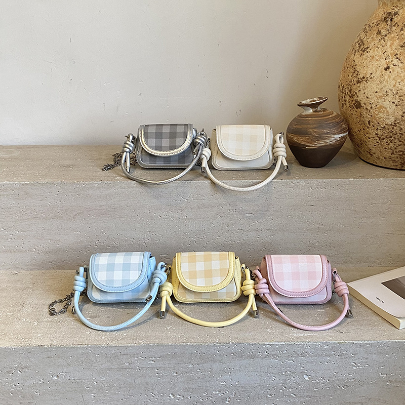 Coreana de estilo extranjero estricto bolso de hombro para niños mini lindo bolso de cadena de bebé nuevo bolso de cambio para niños