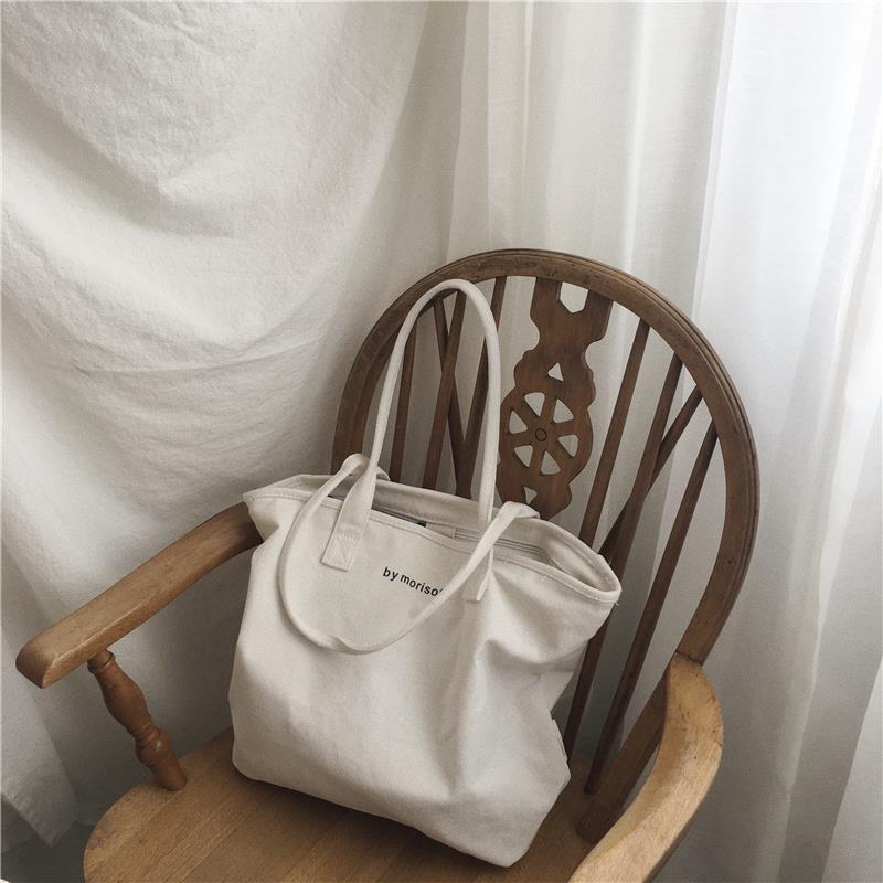 Capacious minimalistic handheld solid color shopping bag