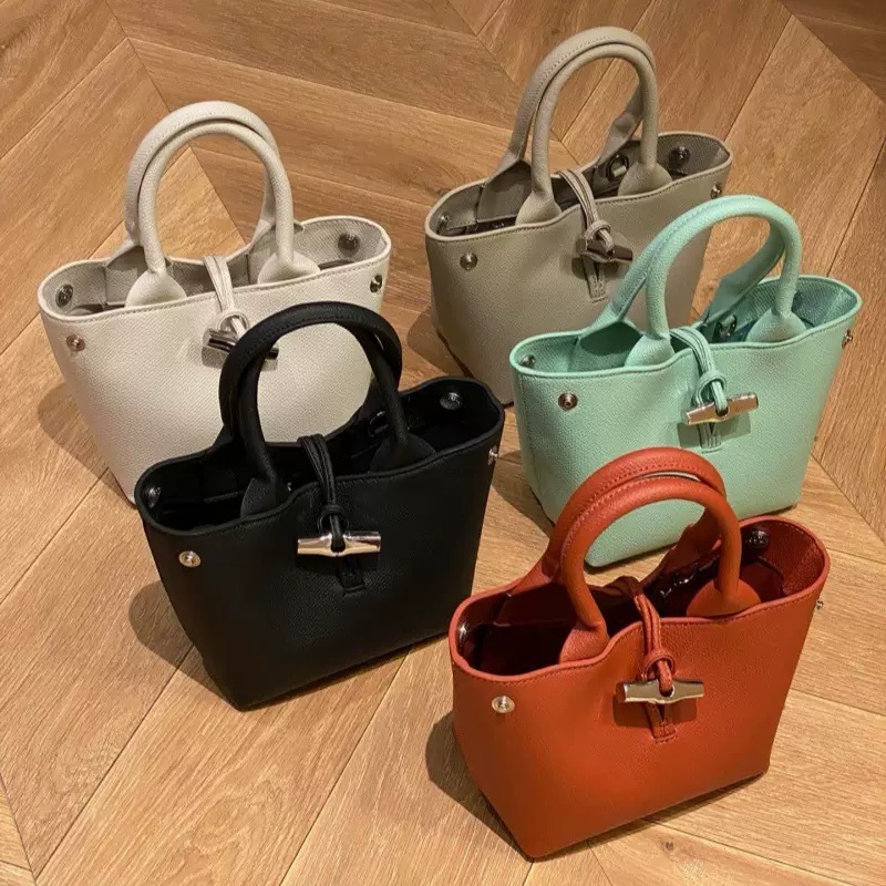 高品質の新しい牛革の竹節の包みのRoseauのミニのハンドバッグの竹節のボタンの斜めのショルダーバッグの牛革のカジュアルな包みの女性|undefined