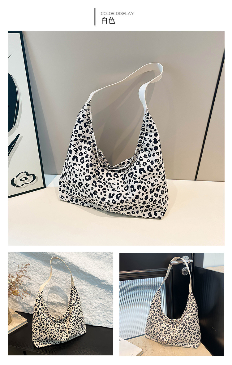 A new minimalist canvas bag with a large capacity in Korean fashion, a leopard print commuter single-shoulder crossbody bag undefined