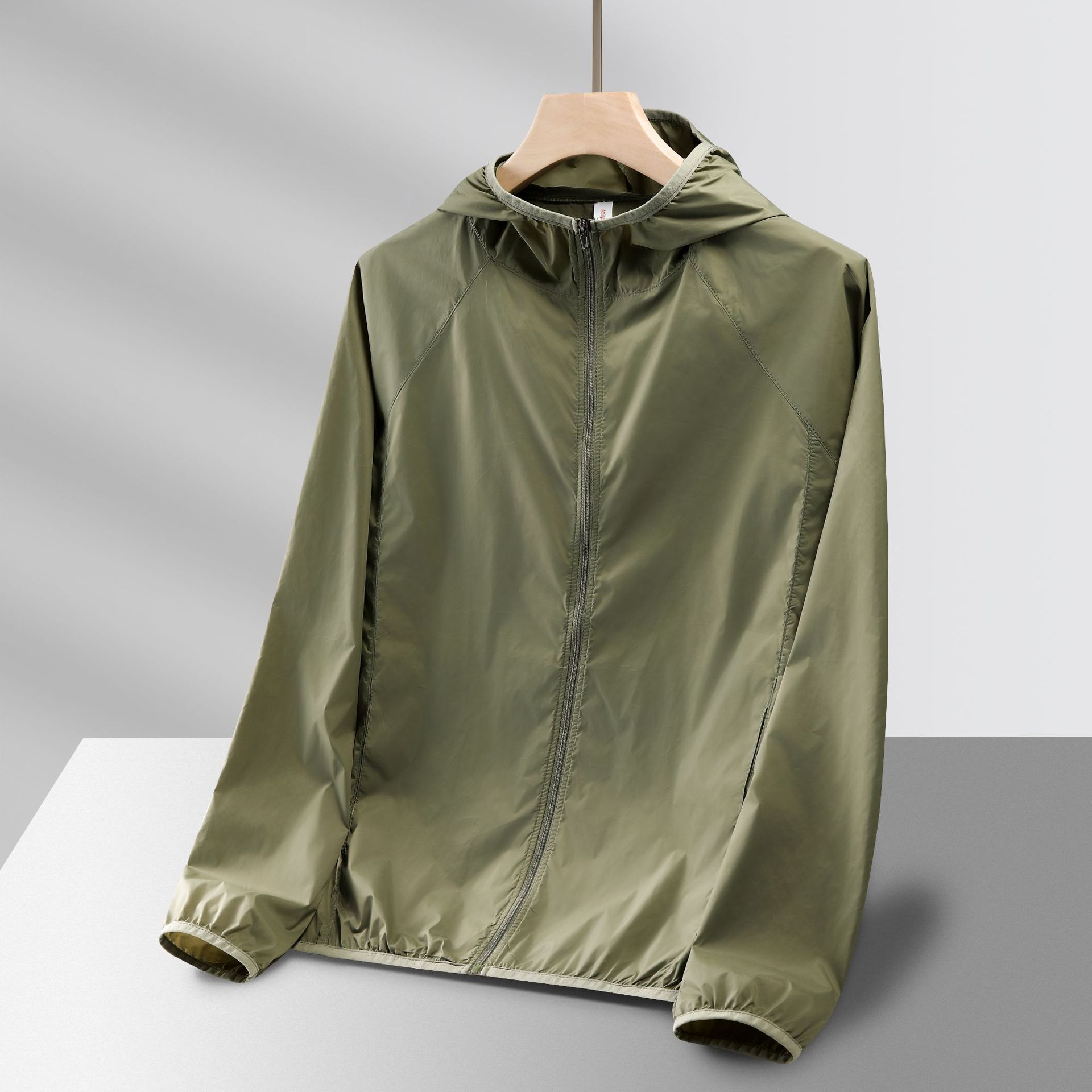 Color caramelo ropa de piel transpirable ultraligera al aire libre verano protección UV protección solar chaqueta superior hombres y mujeres personalizados