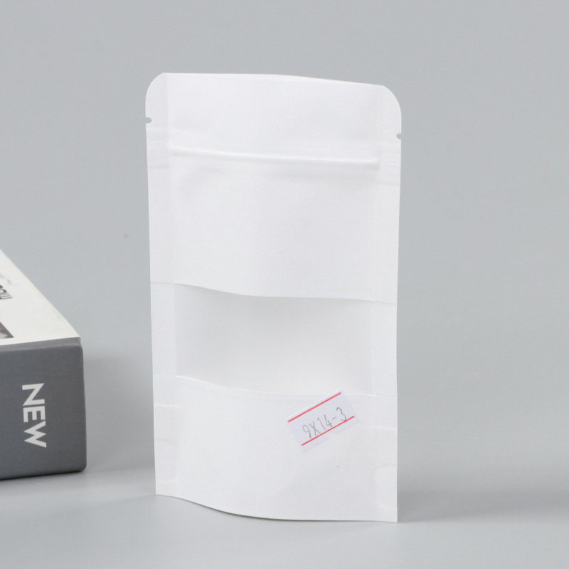 Spot bolsa de papel kraft con ventana transparente bolsa de embalaje de alimentos autosellada autoportante bolsa de té sellada de ocho lados fácil de rasgar