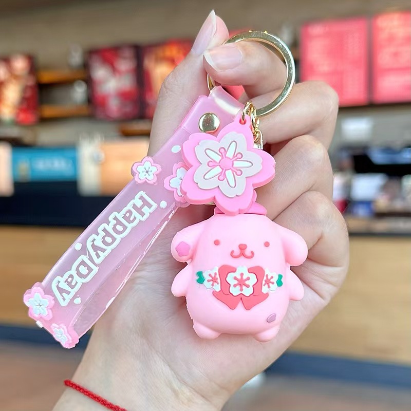 Perro de orejas grandes Melody KT gato pudín perro Kolomi caricatura de silicona llavero colgante bolsa colgante caja ciega regalo