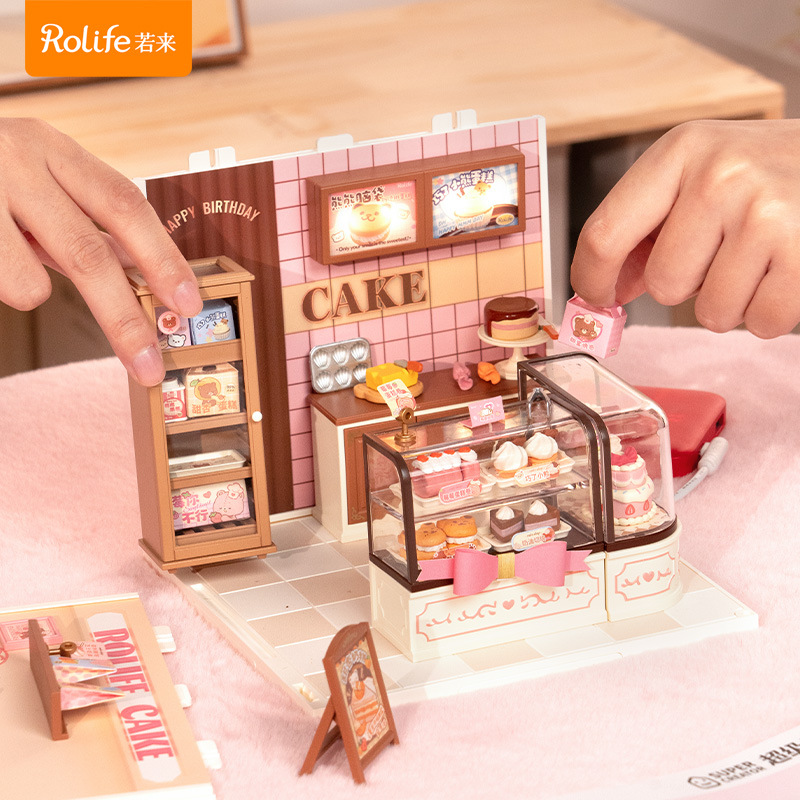 [Regalo de juguete de bricolaje] Ruo Lai Super World Bloques de rompecabezas ensamblados Modelo de juguete Tienda de pasteles Cabaña de bricolaje