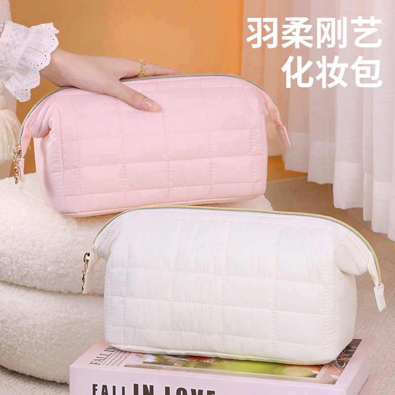 Nuevo transfronterizo pluma suave gangyi bolsa de maquillaje viaje portátil de alta capacidad sensación bolsa de maquillaje bolsa de maquillaje