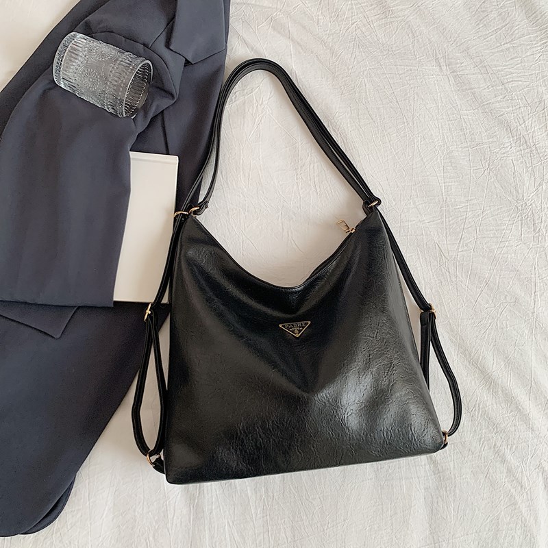 Bolso de mujer de gran capacidad primavera y verano 2025 nuevo tipo de mochila de cadena mochila de hombro de alta calidad sensación de viaje bolsa