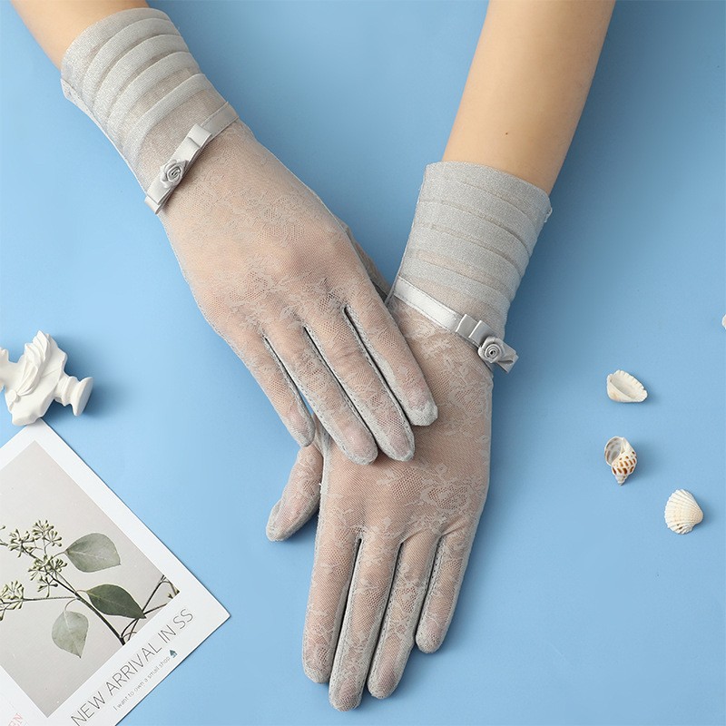 Guantes de protección solar primavera y verano encaje arco guantes de pantalla táctil de conducción de las mujeres transpirable al aire libre protección solar guantes de equitación