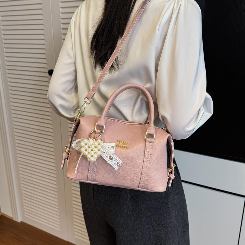 2026 nuevo bolso de bolos de mano de mujer simple sensación cotidiana de nicho de viaje coreano bolso de mujer bolso de almohada