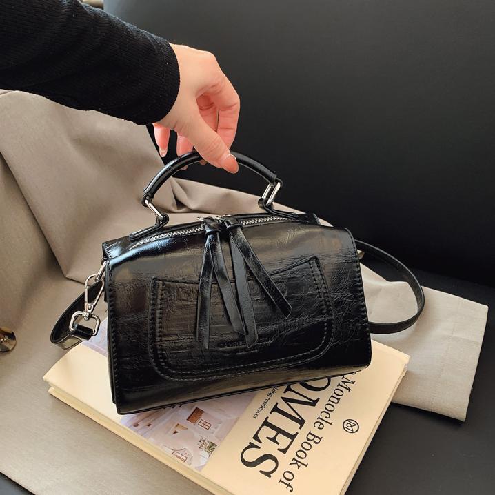 Bolso de mano de tendencia retro para mujeres 2025 nuevo diseño versátil bolso de almohada transfronterizo simple alta sensación mochila