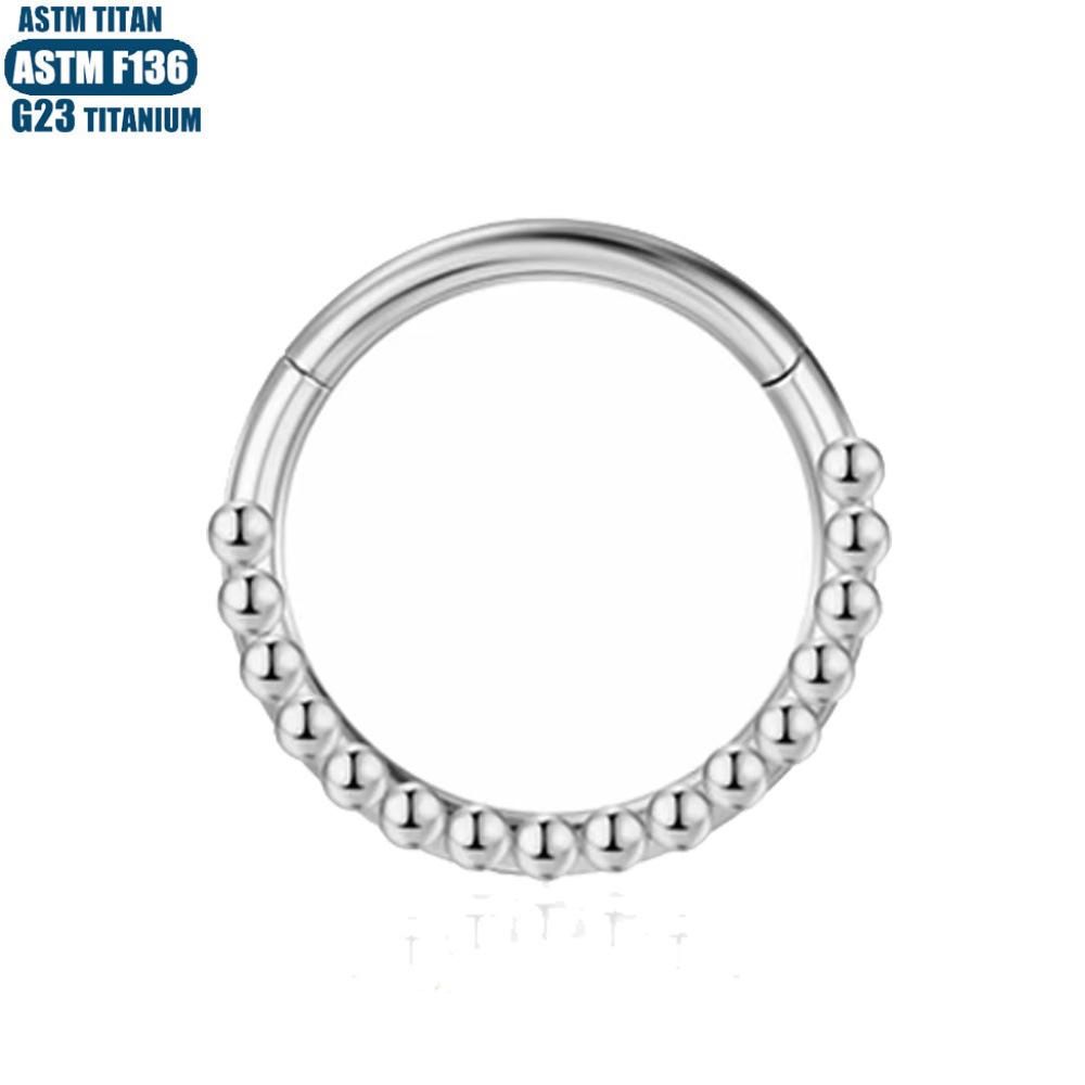 Silver pointed spike labret stud material detail