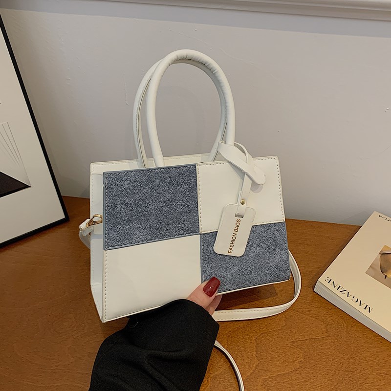Bolso de hombro con diseño de costura de color en contraste nuevo estilo de primavera y verano 2025 estilo ins bolso cuadrado pequeño bolso de viaje de moda mujer