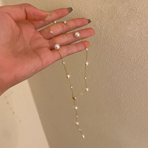 Elegant clavicle chain, small fresh titanium steel gypsophila pearl necklace, Japanese and Korean simple tassel versatile personalized necklace for women