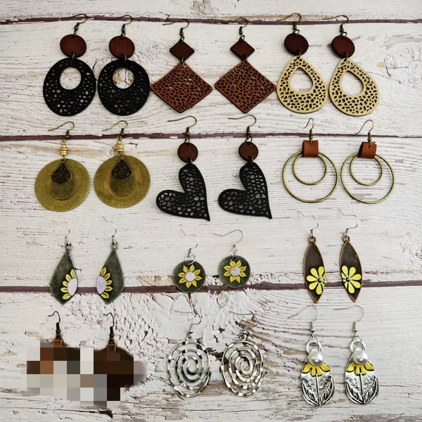 Europe and the United States cross-border Amazon retro fashion Joker Bohemian style leather cut hollow alloy painted earrings