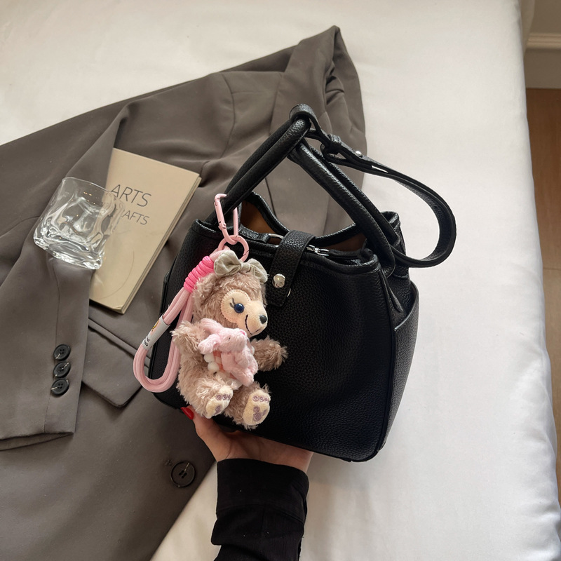 Venta caliente de comercio exterior bolso de cubo de verano mujer 2025 bolso de canasta de verduras de mano nueva tendencia bolso de mensajero de alta gama de todos los partidos