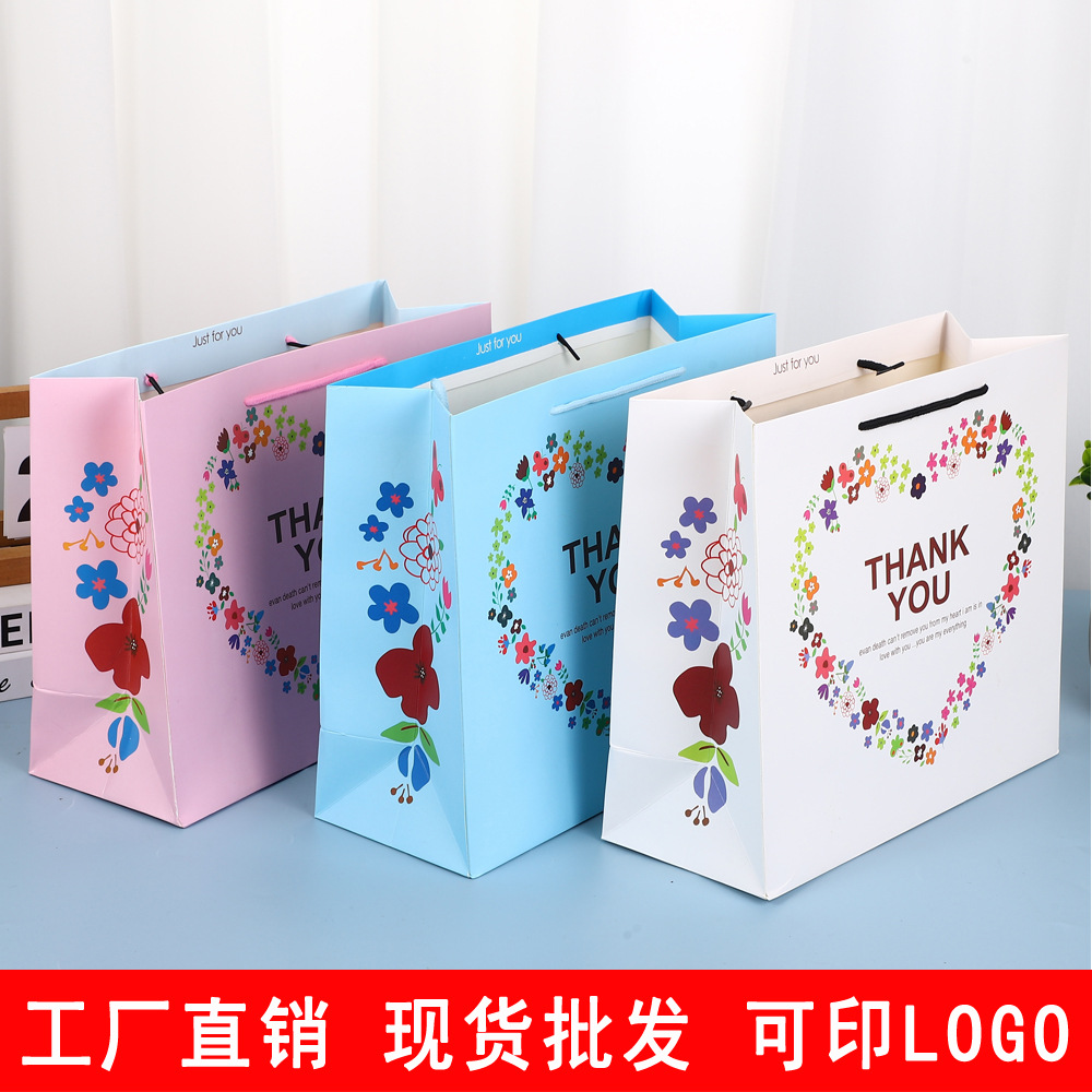 Bolsa de regalo Lindo bolso de cartón blanco impreso LOGO embalaje bolso de dibujos animados regalo de mano al por mayor bolsa de regalo de boda