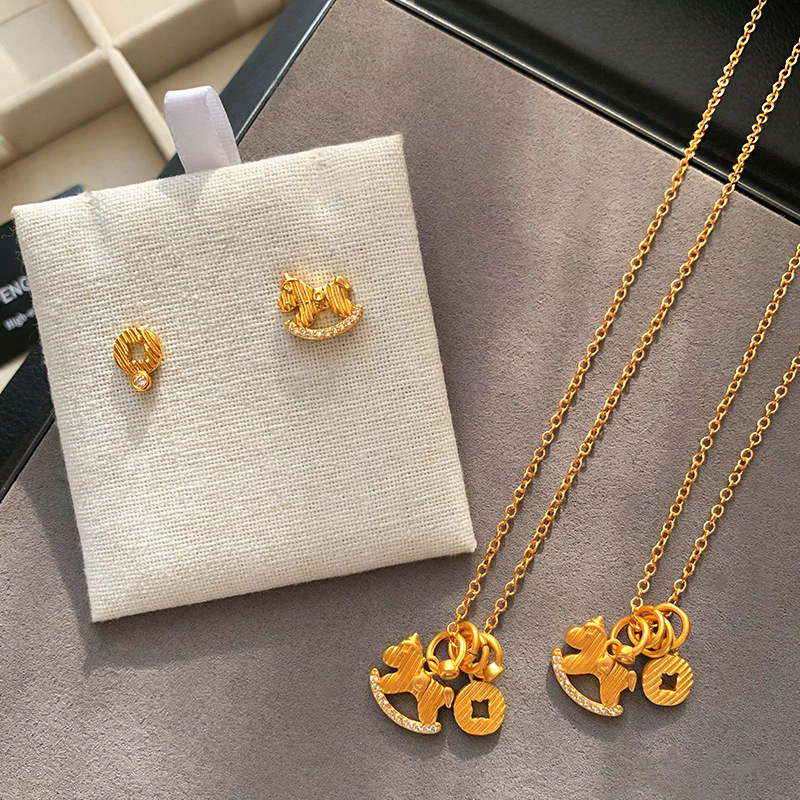 Collier cheval à bascule style chinois effet glacé doré femme_voghion.com