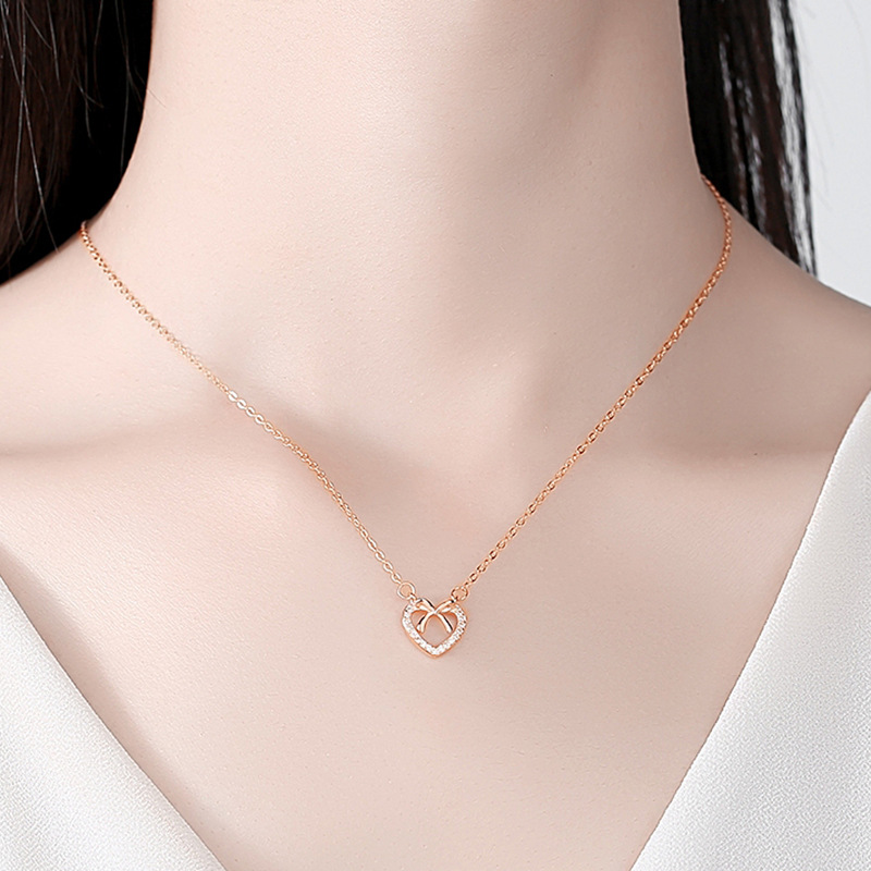 Collar de plata esterlina s925 collar de arco en forma de corazón para las mujeres estilo japonés y coreano de moda estilo coreano en forma de corazón diamante clavícula cadena diseño