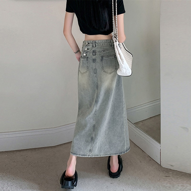 Light colored summer thin long denim skirt