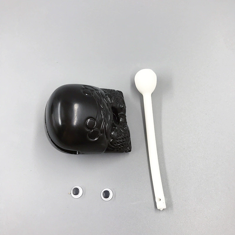 Woodfish percussion toy, plastic, 2" or 3" (6×5×5 cm / 10×8×8 cm), with striker and strap