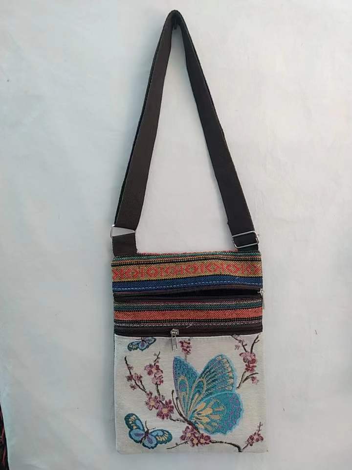 Estilo étnico bordado elefante dibujos animados bolsa de mensajero Dai bolsa de hombro de viaje de las mujeres teléfono móvil bolsa de hombro lateral