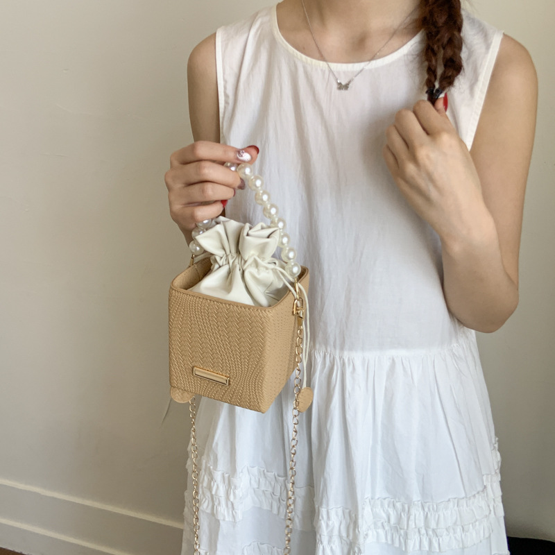 Niche Zhong moda bolso de cubo de mano mujer 2025 nuevo estilo coreano simple versátil bolso de hombro con patrón de ramas