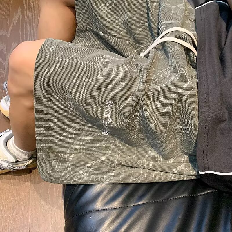 Camisas menos ropa verano nuevos pantalones cortos estadounidenses marca de moda para hombres estilo delgado sentido del diseño nicho holgado pantalones deportivos de gran tamaño