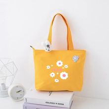 新款简约帆布包日韩女手提包潮卡通文艺手拎零食袋学生环保饭盒包
