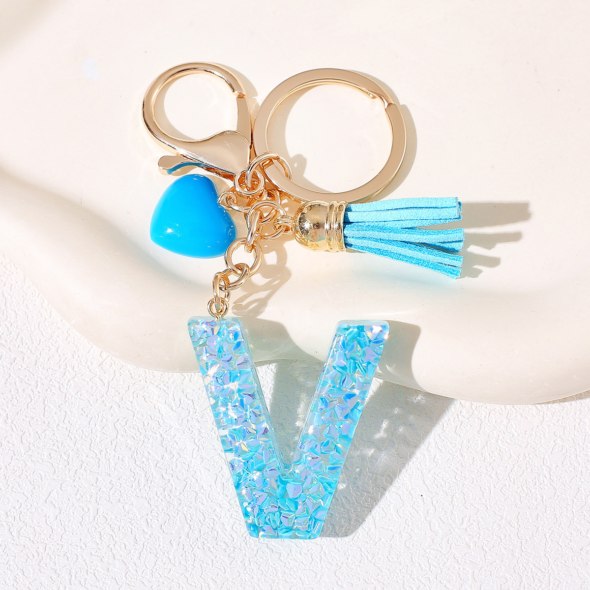 Nuevos productos azules de amor con frascos de letras lindos enclavadores decoraciones europeas y americanas populares llaveros damas