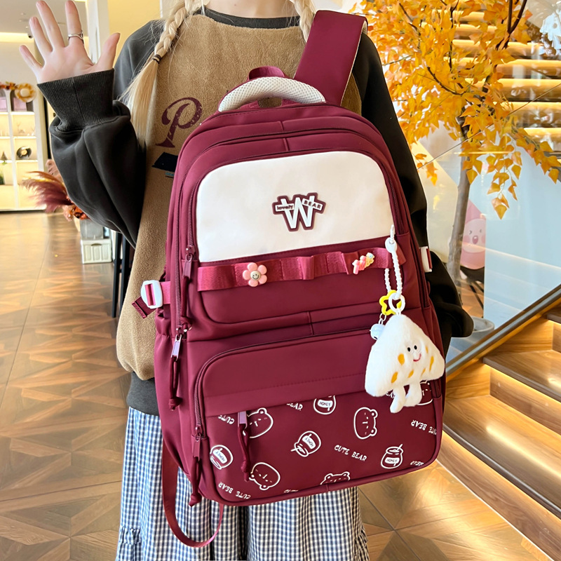 Nueva mochila de hombro simple letras negras con lindos colgantes mochila de carga mochila de gran capacidad