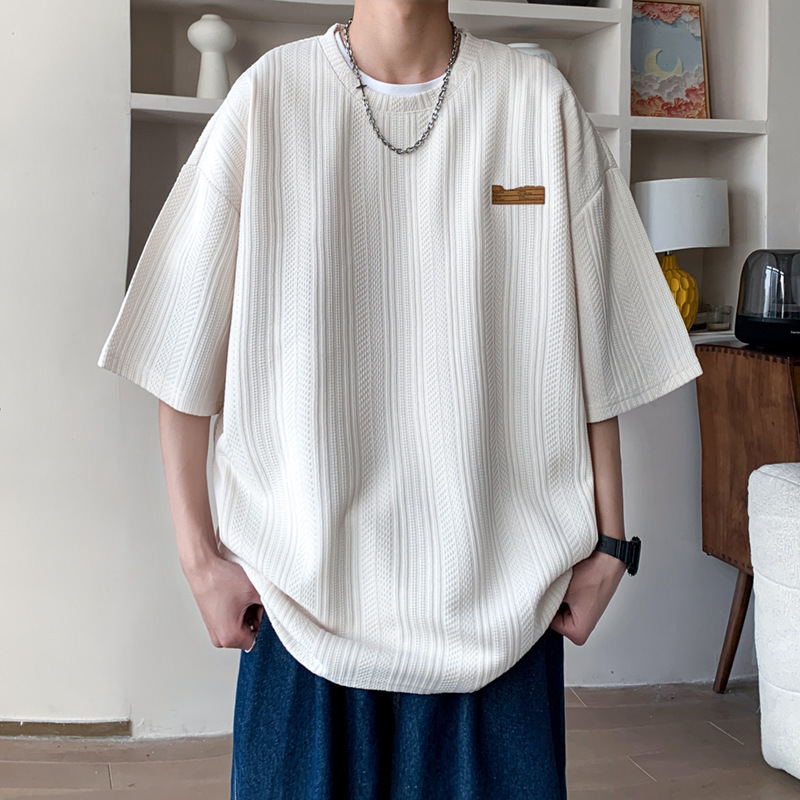 Camiseta de manga corta de verano de Hong Kong Tide para hombres inins coreanos sueltos versátiles Jacquard camiseta de cuello redondo de marca de marea chaqueta transpirable