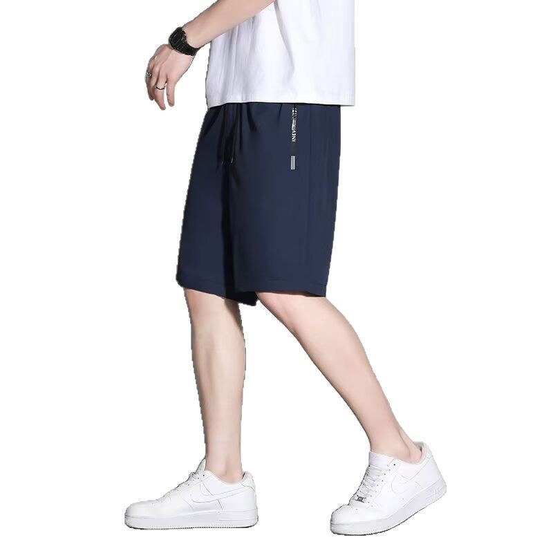 Verano nuevo estilo pantalones cortos estadounidenses marca de moda masculina estilo delgado sentido de diseño nicho holgado talla grande deportes ocio pantalones de cinco puntos