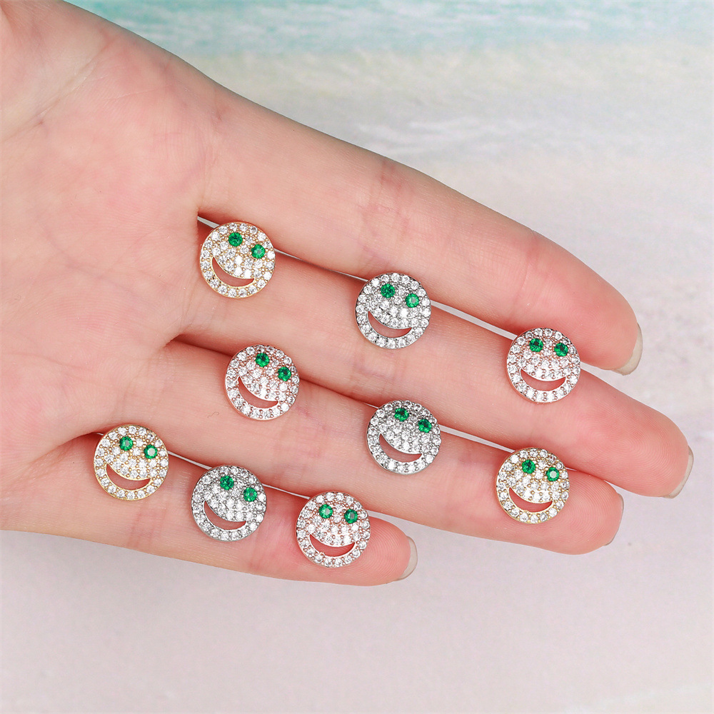 Classic Retro Smiley Ear Bone Studs Hollow Green Zircon Eye Earrings Wholesale display picture 5