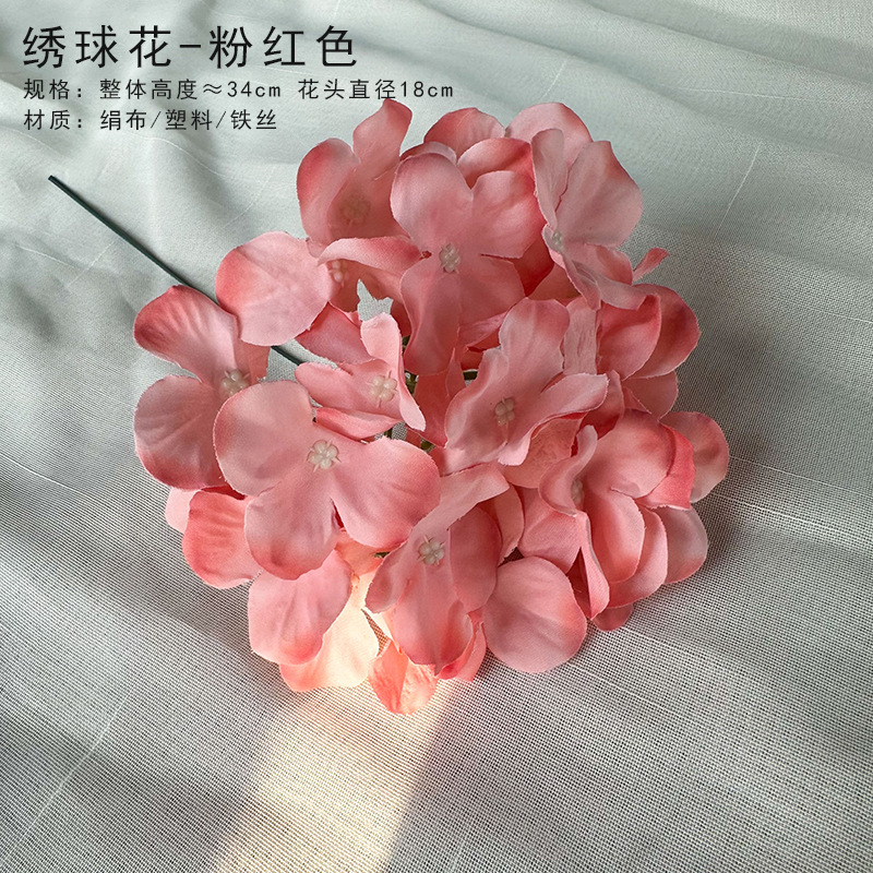 Pink hydrangea head with rod (not inserted)