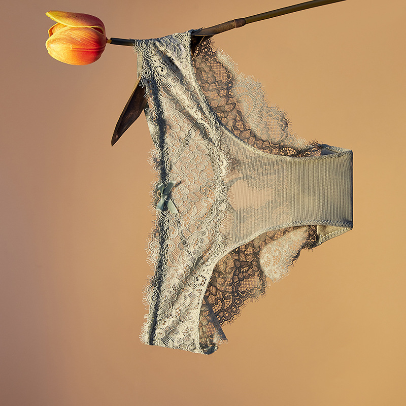 Fábrica de ropa interior transfronteriza cintura baja ropa interior de mujer sexy encaje sexy ropa interior Tanga cruzada tentación transpirable mujeres