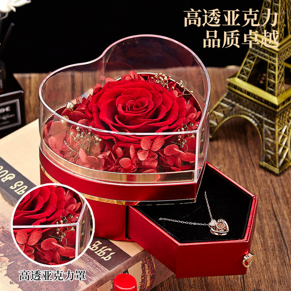 Acrylic ring heart shaped contains rose