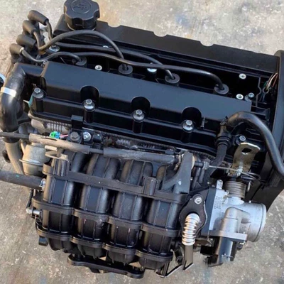 Applicable to Buick Excelle engine 1.6 Baojun weilang Kewei 1.5 yinglang Chevrolet covoz gearbox (Engine assembly)