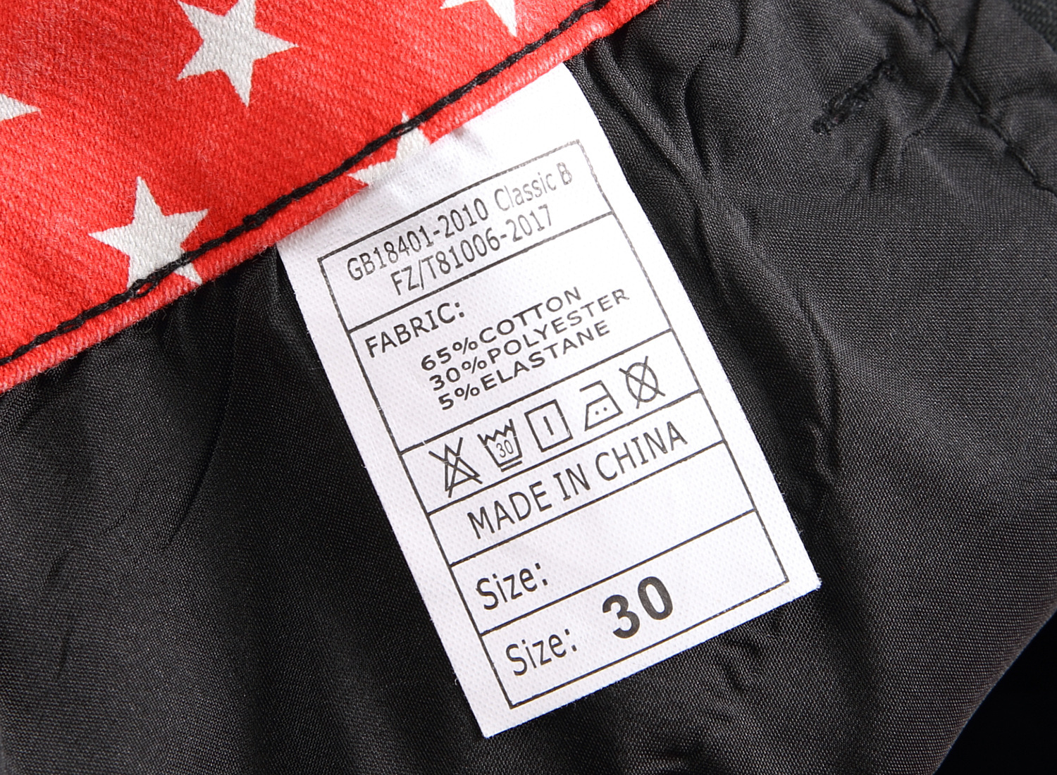 Jeans slim fit da uomo con ricami e tessuto denim elastico_voghion.com