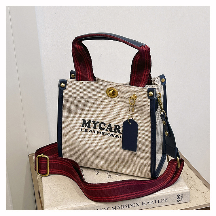 Bolsa de mano de lona de gran capacidad para mujeres 2024 nueva moda impresa letras mochilas bolsa de viaje casual