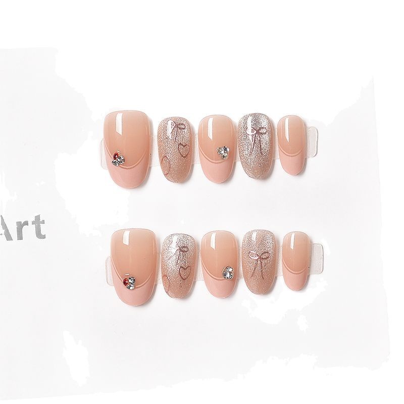 Pink corto ovalado francés con lazo dorado, parche de uñas, parche de uñas, parche de uñas de diamantes hechos a mano de alta calidad
