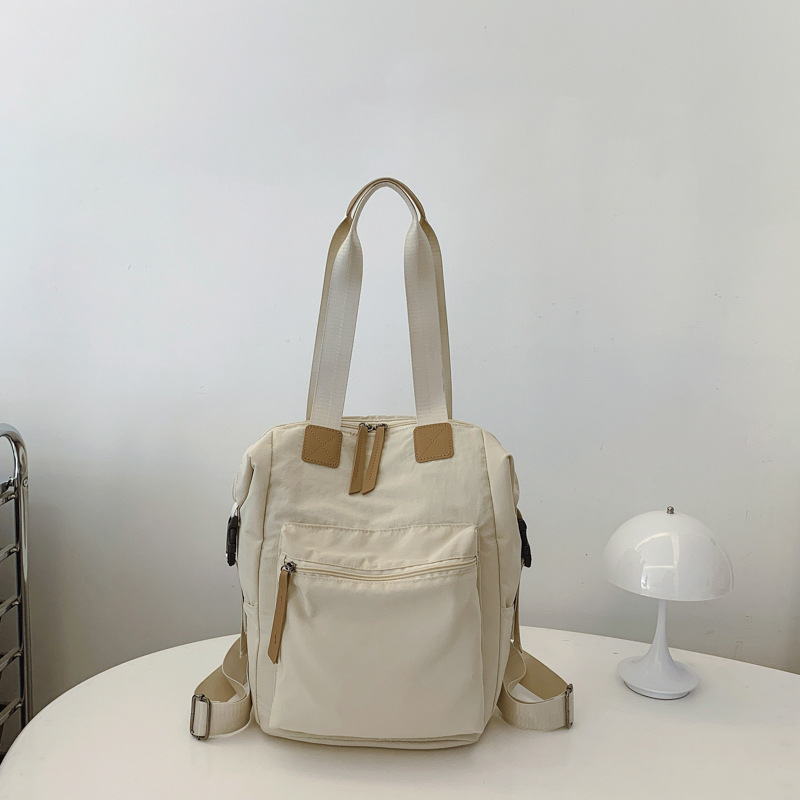 Bolsa de mano de gran capacidad 2025, nueva mochila de moda japonesa, mochila de hombro de estudiantes universitarios, mochila ligera, moda